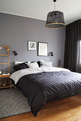 Dark gray walls in the bedroom interior