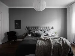 Dark gray walls in the bedroom interior