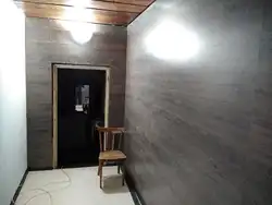Hallway lined with laminate photo