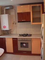 Kitchen Design With Boiler And Refrigerator