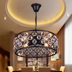 Chandelier in the kitchen living room in a modern style in the interior