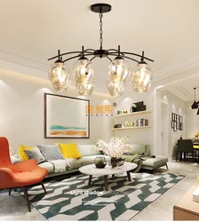 Chandelier in the kitchen living room in a modern style in the interior