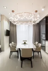 Chandelier in the kitchen living room in a modern style in the interior
