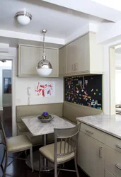 Kitchen design in Khrushchev with a sofa