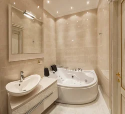 Photo of a bathtub with a jacuzzi in an apartment
