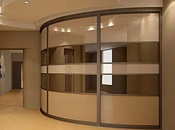 Radius wardrobe in the hallway photo