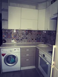 Kitchen renovation in Khrushchev with refrigerator and washing machine photo