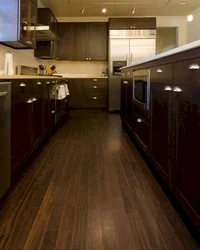 Dark brown floor in the kitchen interior