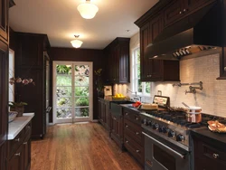 Dark brown floor in the kitchen interior