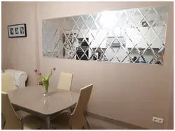 Kitchen design with mirror tiles on the wall