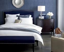 Blue bed in the bedroom interior