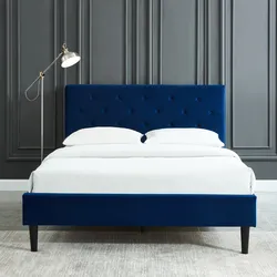 Blue bed in the bedroom interior
