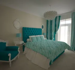 Bedroom with turquoise bed photo