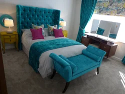 Bedroom with turquoise bed photo