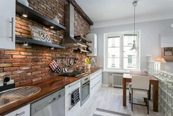 Red brick in the kitchen interior