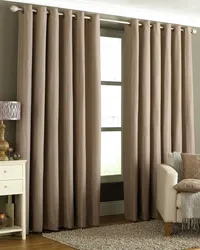 Curtains with eyelets in the living room interior