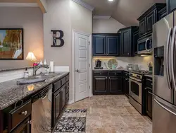 Dark floor kitchen photo design