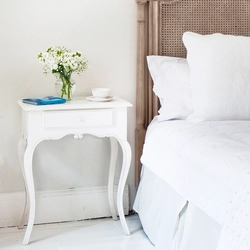 Bedside table in the bedroom interior