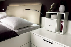 Bedside table in the bedroom interior