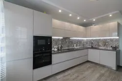 Glossy kitchen in a modern style photo white