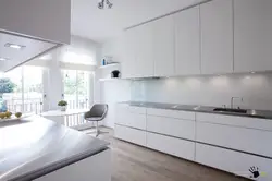 Glossy kitchen in a modern style photo white