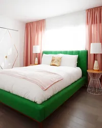 Green bed in the bedroom interior