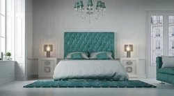 Green bed in the bedroom interior