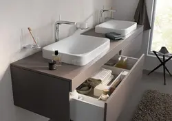 Bathtub interiors with floor-mounted sink