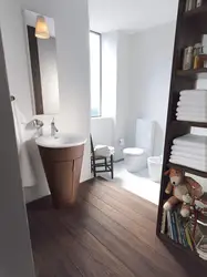 Bathtub interiors with floor-mounted sink