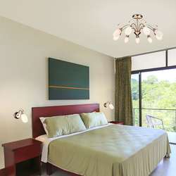 How to hang sconces above the bed in the bedroom photo