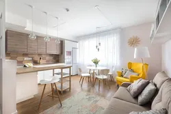 Kitchens in light colors with a sofa photo