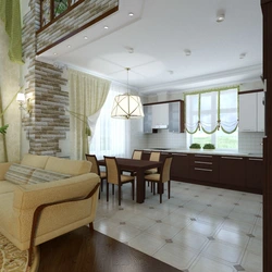 Design of a living room combined with a kitchen and access to the terrace