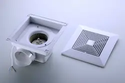 Suspended ceiling in the bathroom with a hood photo