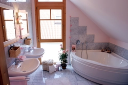 Bathroom design with a window in a country house