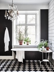 Black floor in the bathroom interior photo