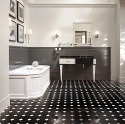 Black floor in the bathroom interior photo