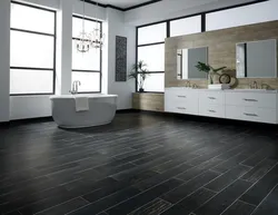 Black floor in the bathroom interior photo