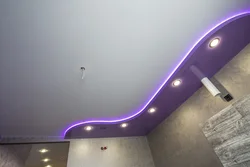 Photo of two-level plasterboard ceilings in the kitchen with lighting