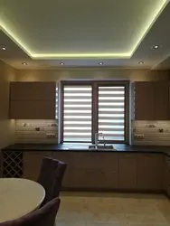 Photo of two-level plasterboard ceilings in the kitchen with lighting