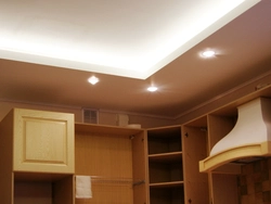 Photo of two-level plasterboard ceilings in the kitchen with lighting