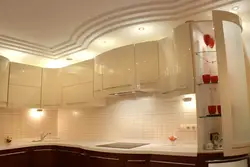 Photo of two-level plasterboard ceilings in the kitchen with lighting