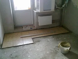 Photo of kitchen floors made of tiles in Khrushchev