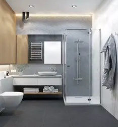 Сұр тондардағы душымен ванна бөлмесінің дизайны