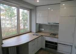 Kitchen design 9 m by the window photo