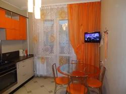 Orange kitchen in the interior photo with which curtains