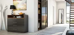 Hallway interior with chest of drawers and mirror