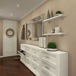 Hallway interior with chest of drawers and mirror