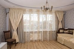 How to choose the color of curtains in the living room interior