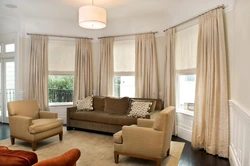 How to choose the color of curtains in the living room interior