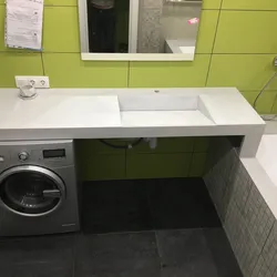 Дохили ҳаммом бо countertop барои мошини ҷомашӯӣ
